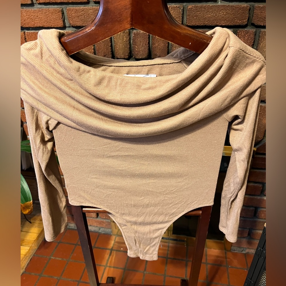 Of shoulder long sleeves body size L by egreis in like new condition
